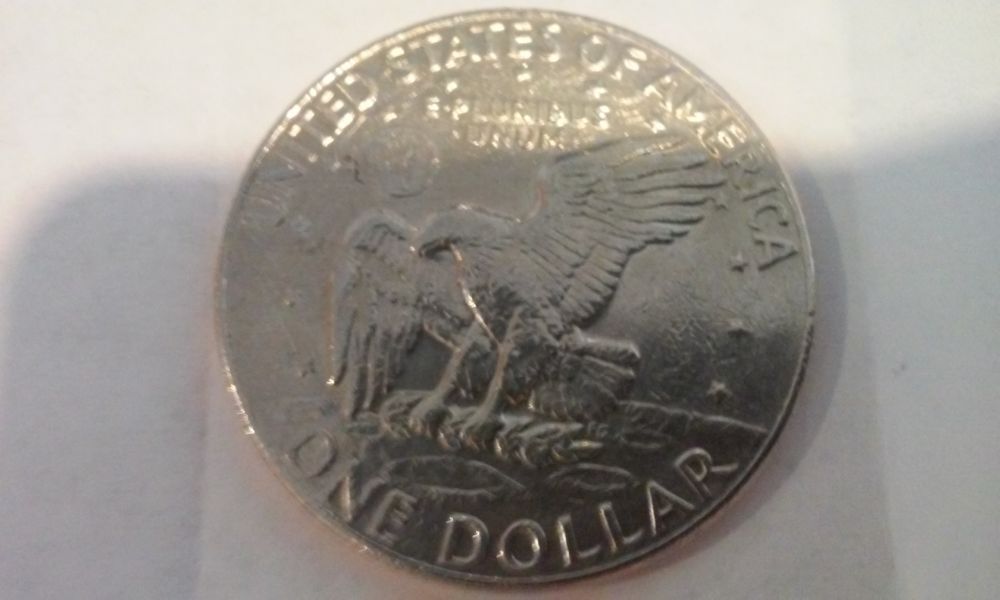 Help!-1977-D-Ike-Dollar-With-Smooth-Edge